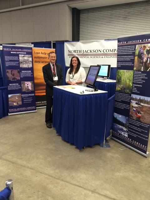 North Jackson Company staff at a conference booth