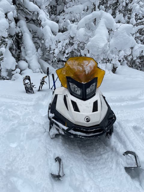 Field scientist working in snowy conditions